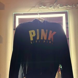 very pretty pink sweatshirt.